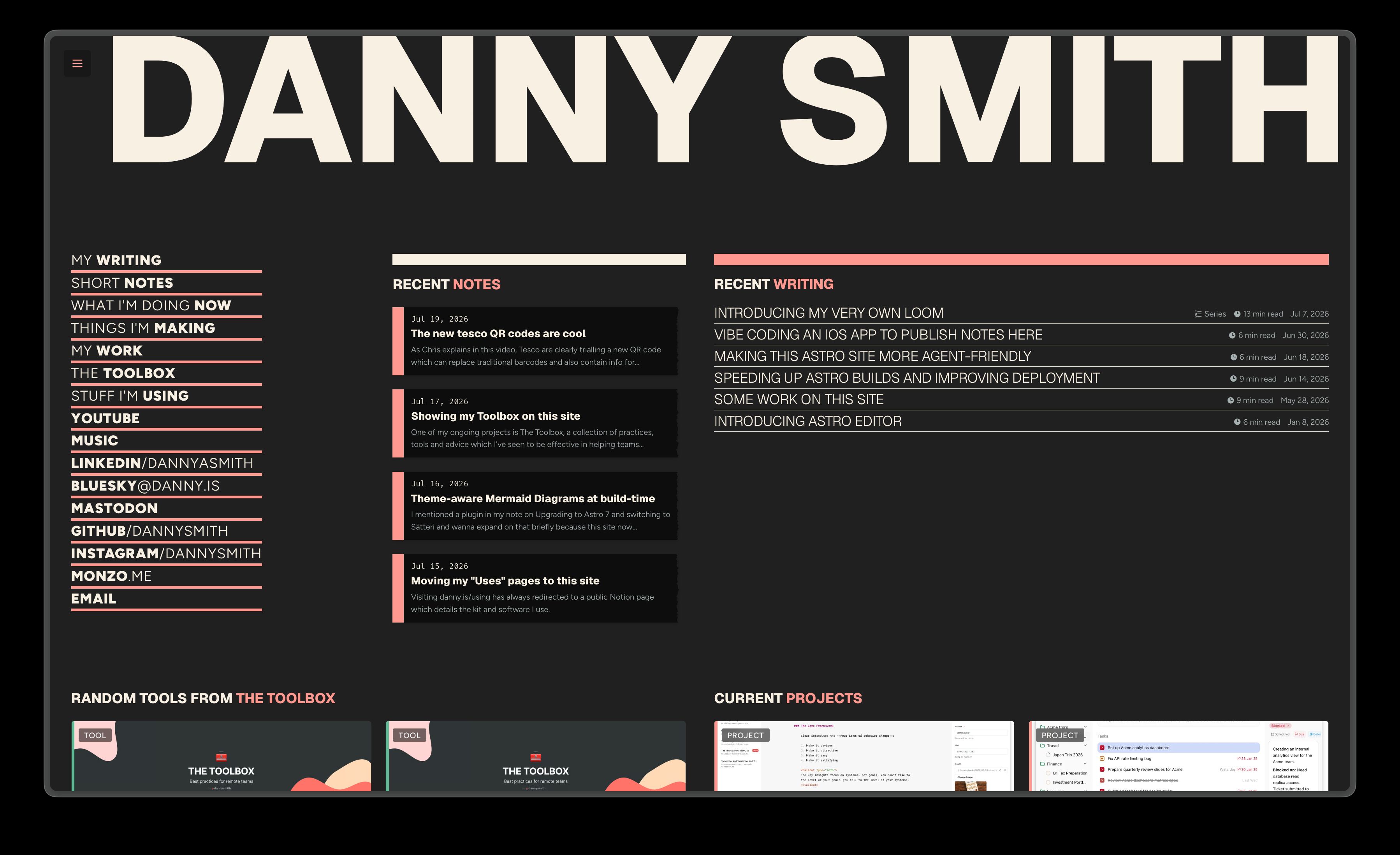 The redesigned homepage in dark mode, showing recent articles and torn-paper note cards